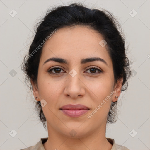 Joyful latino young-adult female with medium  brown hair and brown eyes