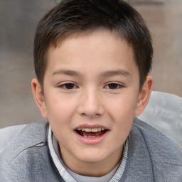 Joyful white child male with short  brown hair and brown eyes