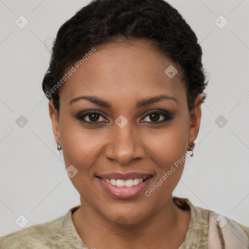 Joyful black young-adult female with short  brown hair and brown eyes