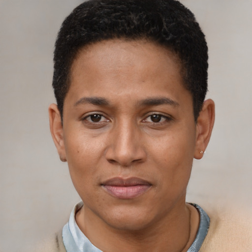 Joyful black young-adult female with short  brown hair and brown eyes