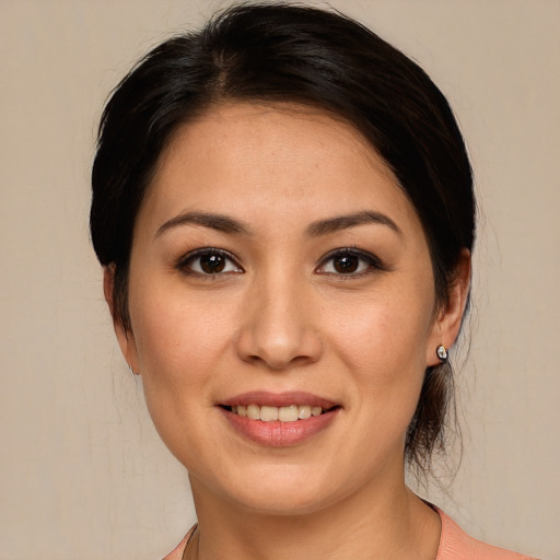 Joyful white young-adult female with medium  brown hair and brown eyes