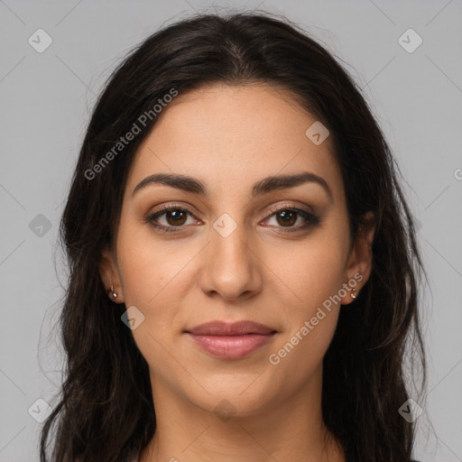 Joyful latino young-adult female with long  brown hair and brown eyes