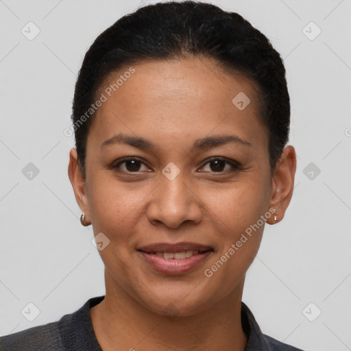 Joyful latino young-adult female with short  brown hair and brown eyes