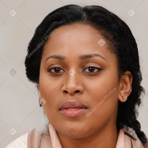 Joyful black young-adult female with medium  black hair and brown eyes