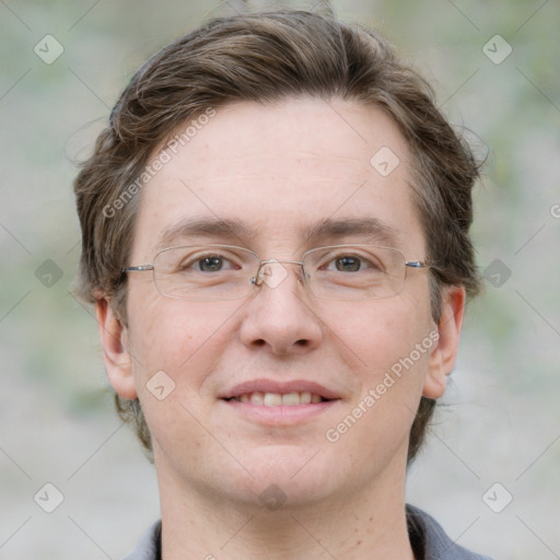 Joyful white adult male with short  brown hair and grey eyes