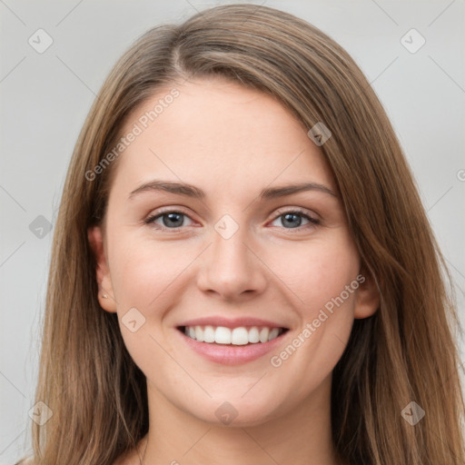 Joyful white young-adult female with long  brown hair and grey eyes