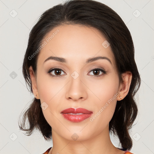 Joyful white young-adult female with medium  black hair and brown eyes