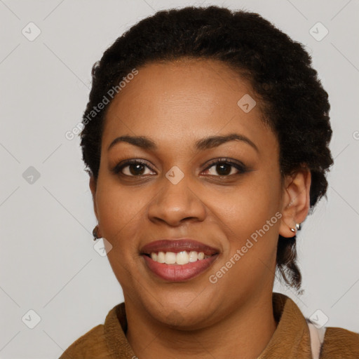 Joyful latino young-adult female with short  black hair and brown eyes