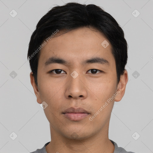 Neutral asian young-adult male with short  black hair and brown eyes