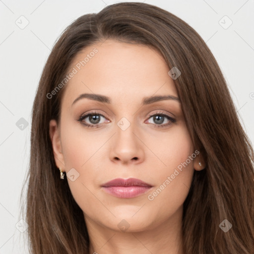 Neutral white young-adult female with long  brown hair and brown eyes