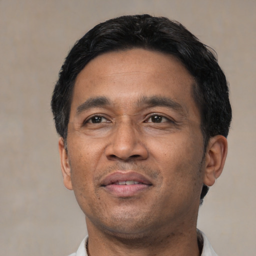Neutral asian adult male with short  black hair and brown eyes