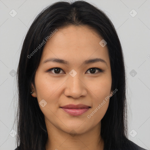 Joyful latino young-adult female with long  brown hair and brown eyes