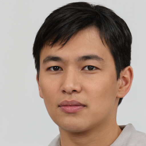 Neutral asian young-adult male with short  black hair and brown eyes