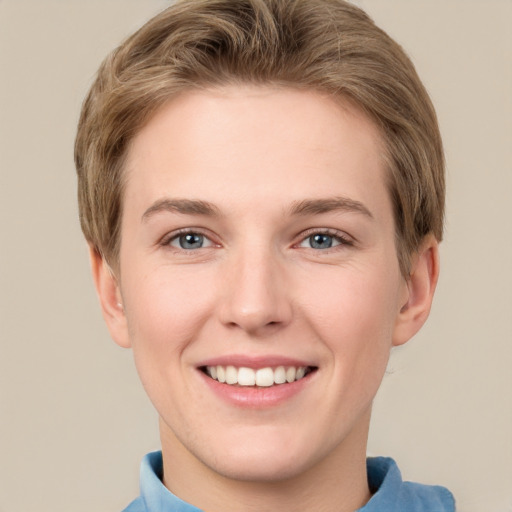 Joyful white young-adult female with short  brown hair and grey eyes