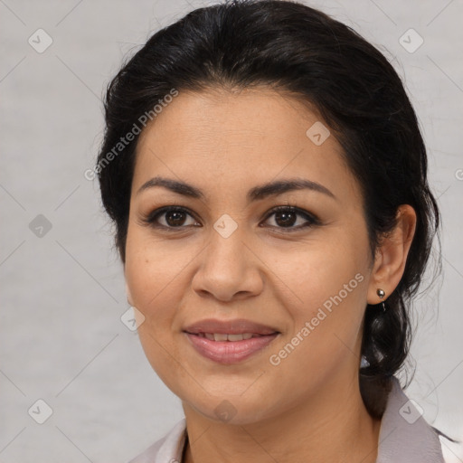 Joyful latino young-adult female with medium  brown hair and brown eyes