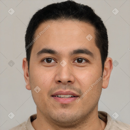 Joyful latino young-adult male with short  brown hair and brown eyes