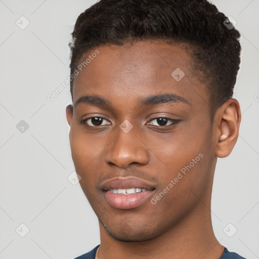 Joyful black young-adult male with short  brown hair and brown eyes