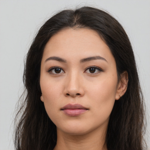 Neutral asian young-adult female with long  brown hair and brown eyes