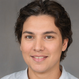 Joyful white young-adult male with medium  brown hair and brown eyes