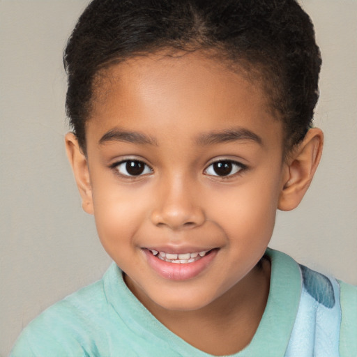 Joyful latino child female with short  brown hair and brown eyes