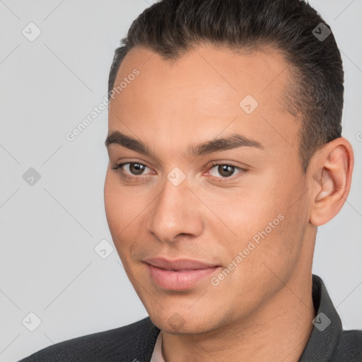 Joyful white young-adult male with short  brown hair and brown eyes