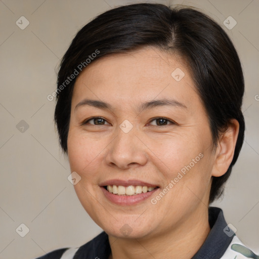 Joyful white adult female with medium  brown hair and brown eyes