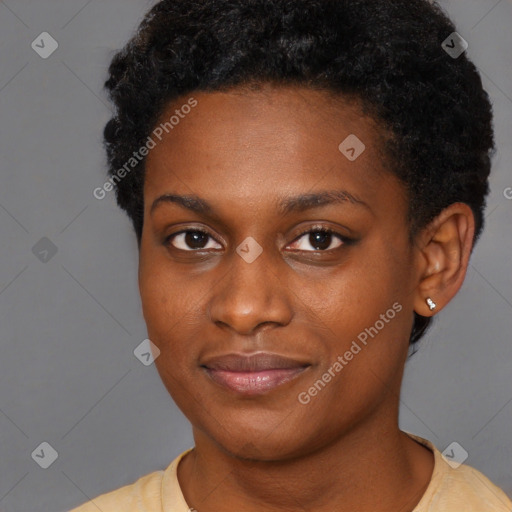 Joyful black young-adult female with short  black hair and brown eyes