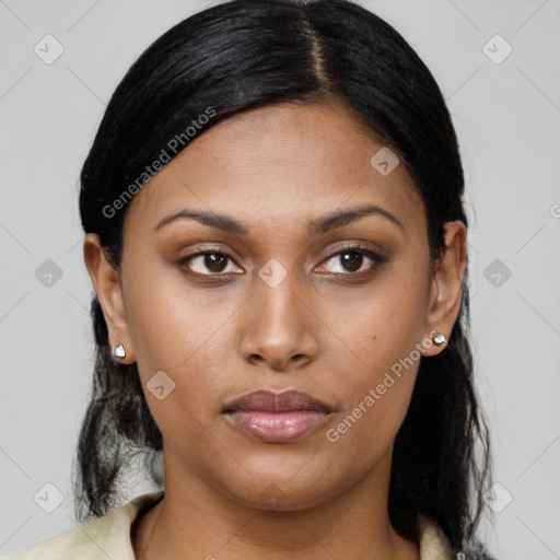 Neutral black young-adult female with medium  brown hair and brown eyes