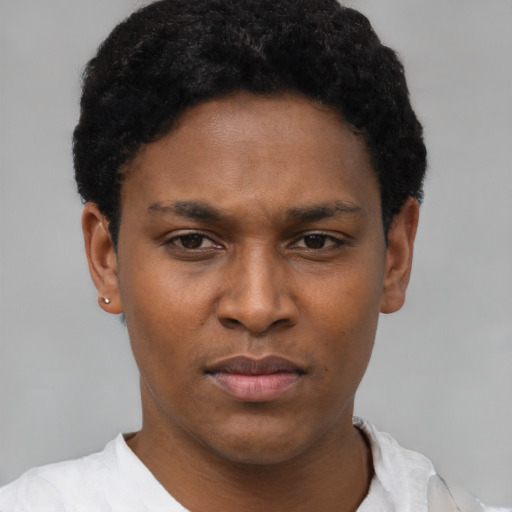 Neutral black young-adult female with short  black hair and brown eyes