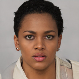 Neutral black young-adult female with short  brown hair and brown eyes