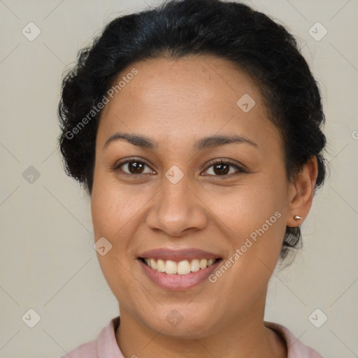 Joyful latino young-adult female with short  brown hair and brown eyes