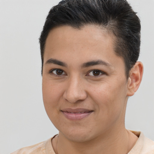 Joyful latino young-adult female with short  brown hair and brown eyes