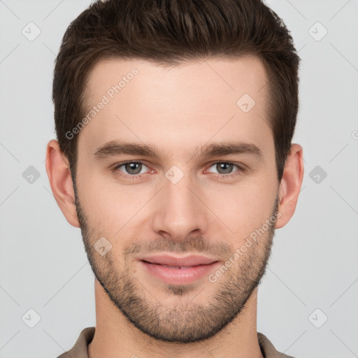 Joyful white young-adult male with short  brown hair and brown eyes