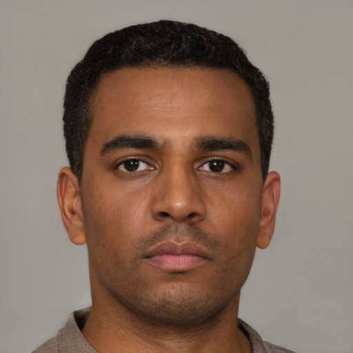 Neutral latino young-adult male with short  brown hair and brown eyes