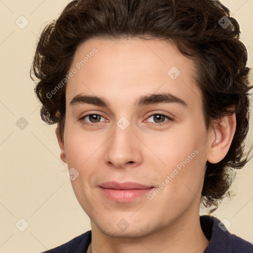 Joyful white young-adult male with medium  brown hair and brown eyes