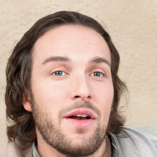 Neutral white young-adult male with short  brown hair and blue eyes