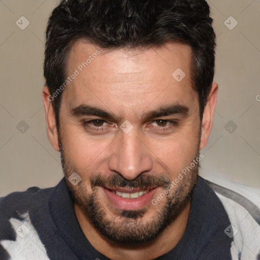 Joyful white adult male with short  black hair and brown eyes