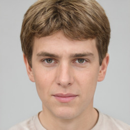 Neutral white young-adult male with short  brown hair and grey eyes