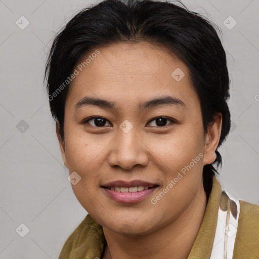 Joyful asian young-adult female with medium  brown hair and brown eyes