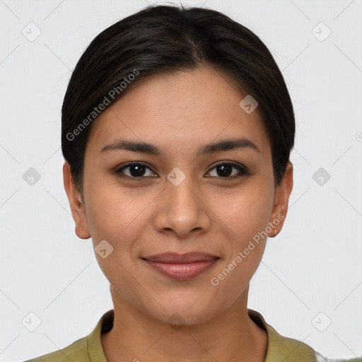 Joyful latino young-adult female with short  brown hair and brown eyes