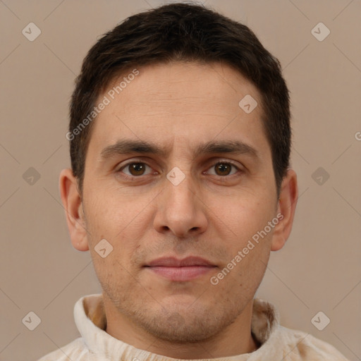 Joyful white adult male with short  brown hair and brown eyes