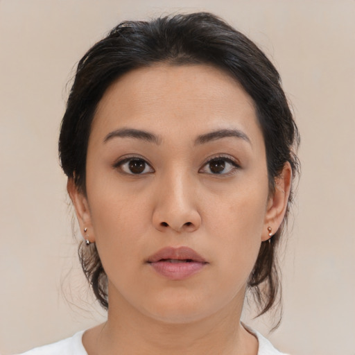 Neutral asian young-adult female with medium  brown hair and brown eyes