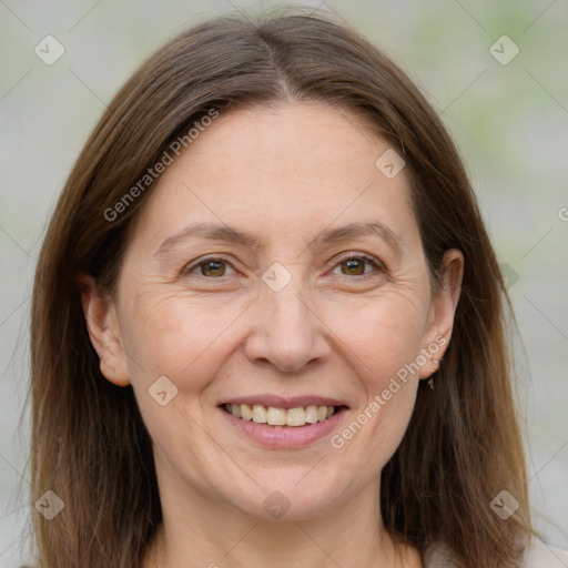 Joyful white adult female with medium  brown hair and brown eyes