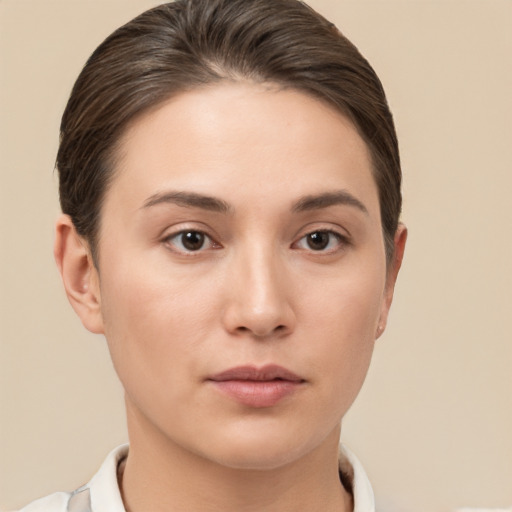 Neutral white young-adult female with short  brown hair and brown eyes