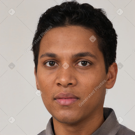 Neutral latino young-adult male with short  black hair and brown eyes