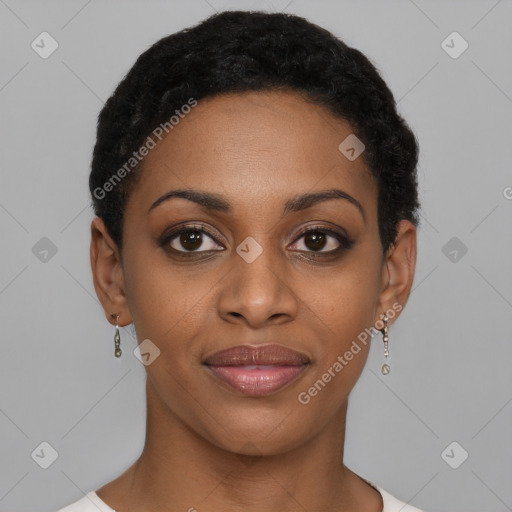 Joyful black young-adult female with short  black hair and brown eyes