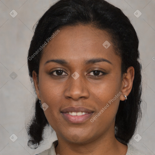 Joyful black young-adult female with medium  black hair and brown eyes