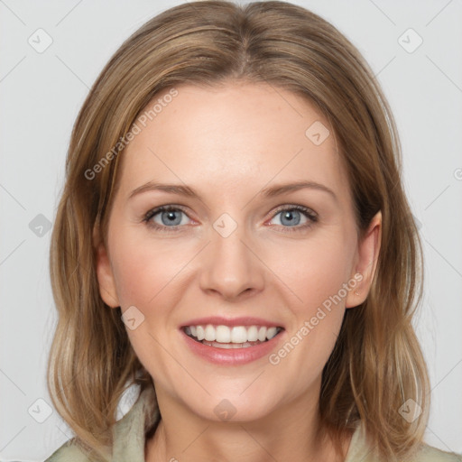 Joyful white young-adult female with medium  brown hair and green eyes