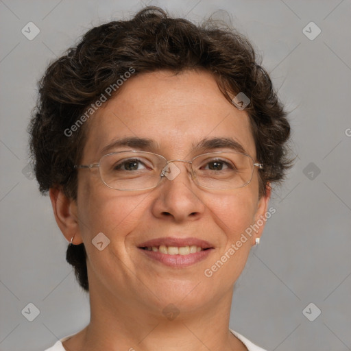 Joyful white adult female with short  brown hair and brown eyes