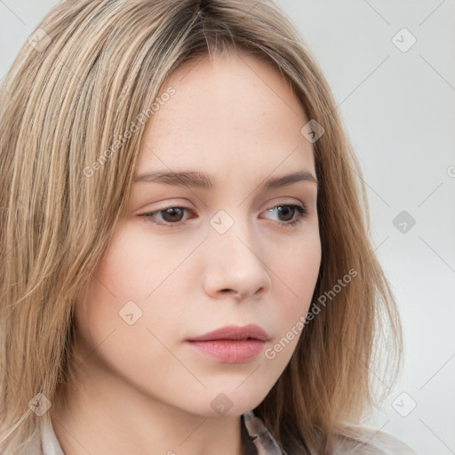 Neutral white young-adult female with long  brown hair and brown eyes